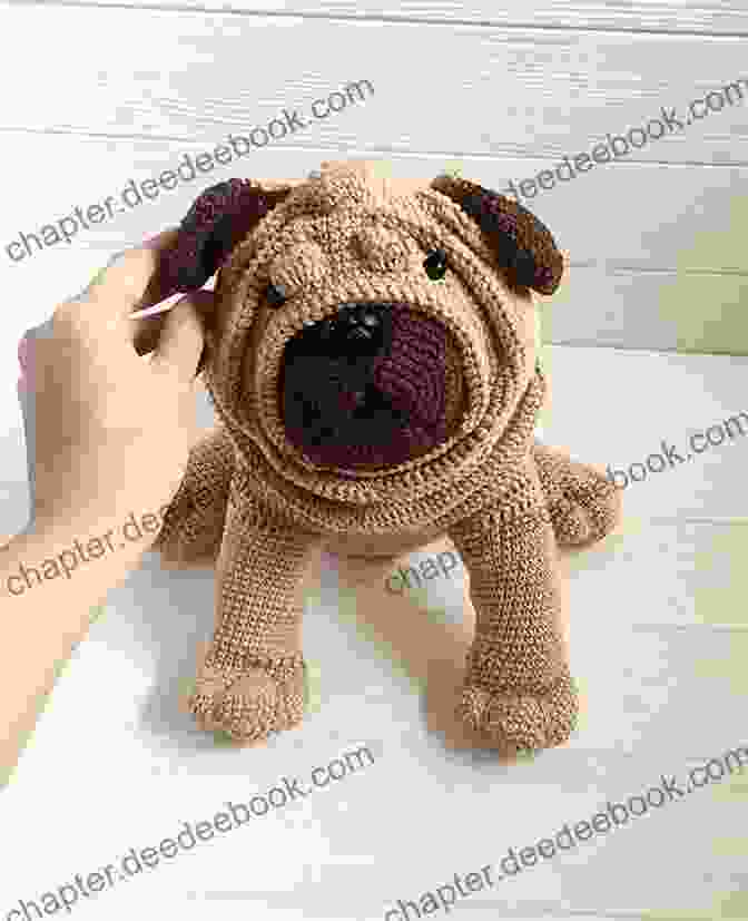A Crocheted Dog Toy With A Yarn Tastic Design, Providing Endless Entertainment For Your Furry Friend. Knitted Cats Dogs: Over 30 Patterns For Cute Kitties And Perfect Pooches