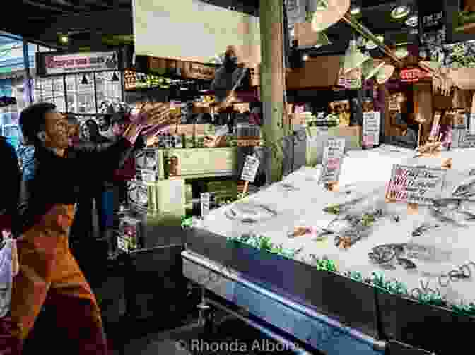 Pike Place Market With Fish Throwing Merchants Seattle Travel Guide With 100 Landscape Photos